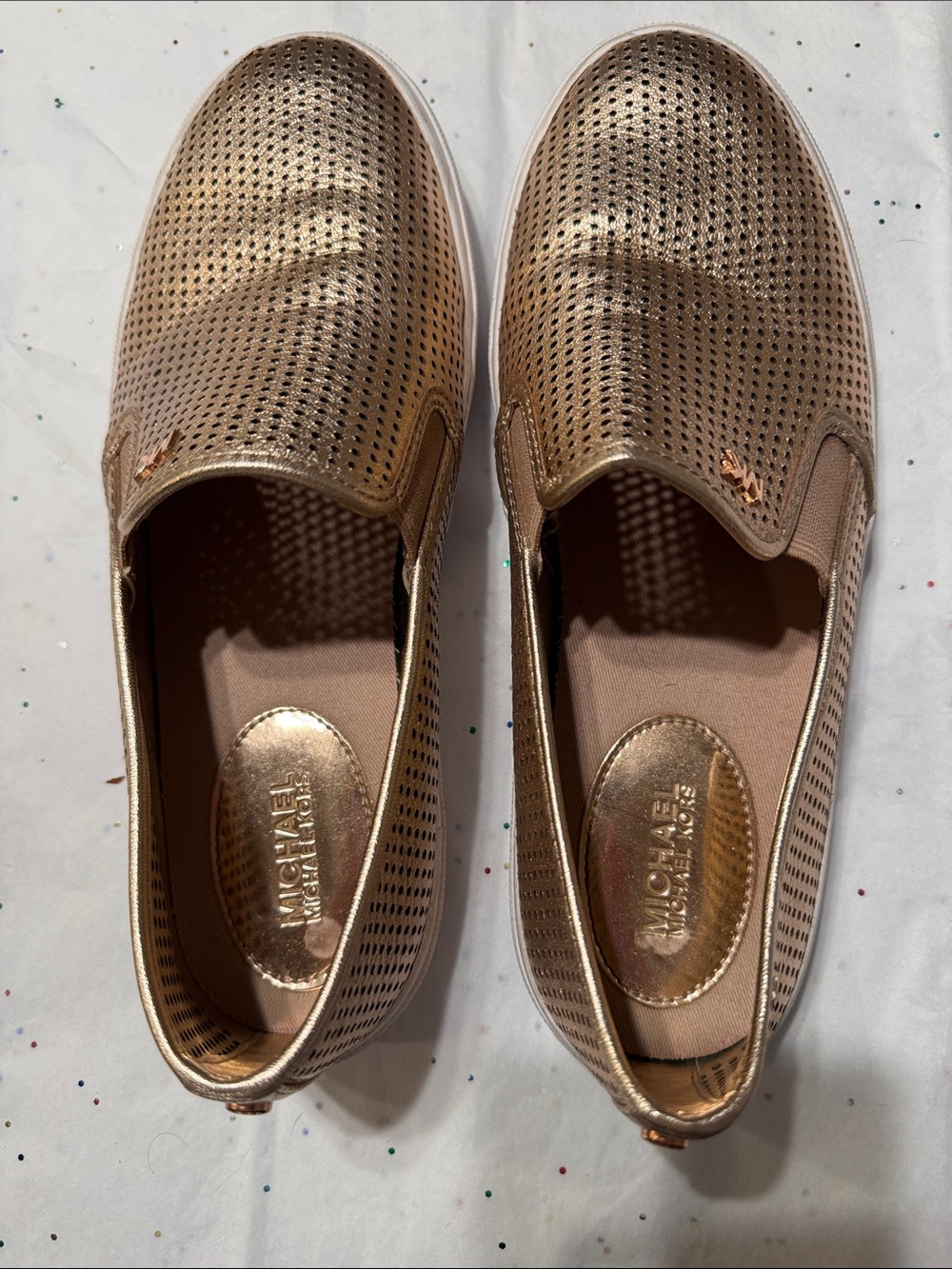 Michael Kors Metallic Rose Gold Perforated Slip-On Sneakers